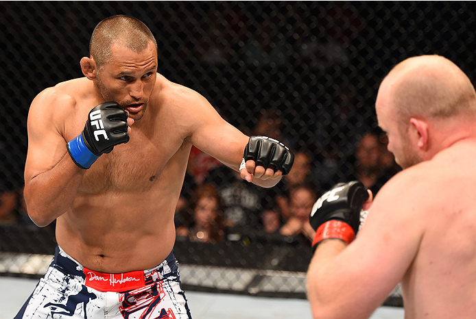 NEW ORLEANS, LA - JUNE 06: (R-l) Dan Henderson circles Tim Boetsch in their middleweight bout during the UFC event at the Smoothie King Center on June 6, 2015 in New Orleans, Louisiana. (Photo by Josh Hedges/Zuffa LLC/Zuffa LLC via Getty Images)