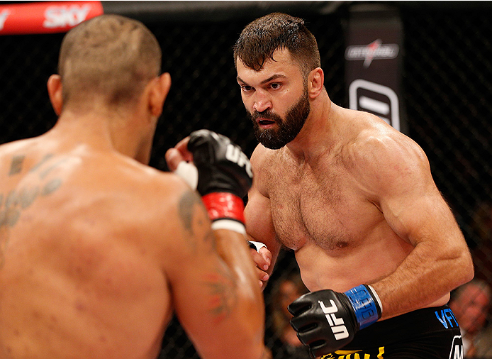 BRASILIA, DF - SEPTEMBER 13: (R-L) Andrei Arlovski of Belarus squares off with Antonio "Bigfoot" Silva of Brazil in their heavyweight bout during the UFC Fight Night event inside Nilson Nelson Gymnasium on September 13, 2014 in Brasilia, Brazil. (Photo by