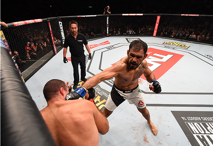RIO DE JANEIRO, BRAZIL - AUGUST 01: (R-L) Rogerio Nogueira of Brazil punches Mauricio 'Shogun' Rua of Brazil in their light heavyweight bout during the UFC 190 event inside HSBC Arena on August 1, 2015 in Rio de Janeiro, Brazil. (Photo by Josh Hedges/Zu