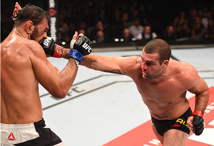 RIO DE JANEIRO, BRAZIL - AUGUST 01: (L-R) Mauricio 'Shogun' Rua of Brazil punches Rogerio Nogueira of Brazil in their light heavyweight bout during the UFC 190 event inside HSBC Arena on August 1, 2015 in Rio de Janeiro, Brazil. (Photo by Josh Hedges/Zu