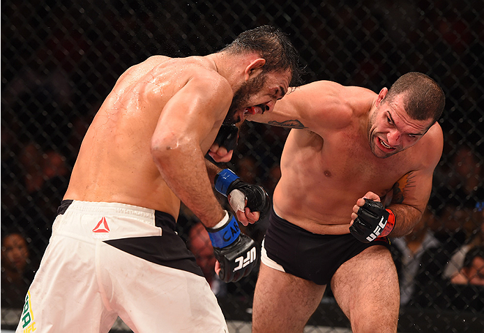RIO DE JANEIRO, BRAZIL - AUGUST 01: (R-L) Mauricio 'Shogun' Rua of Brazil punches Rogerio Nogueira of Brazil in their light heavyweight bout during the UFC 190 event inside HSBC Arena on August 1, 2015 in Rio de Janeiro, Brazil. (Photo by Josh Hedges/Zu