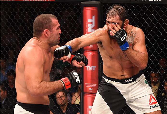 RIO DE JANEIRO, BRAZIL - AUGUST 01: (R-L) Rogerio Nogueira of Brazil punches Mauricio 'Shogun' Rua of Brazil in their light heavyweight bout during the UFC 190 event inside HSBC Arena on August 1, 2015 in Rio de Janeiro, Brazil. (Photo by Josh Hedges/Zu