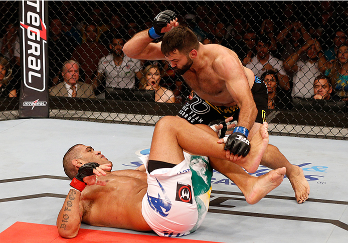 BRASILIA, BRAZIL - SEPTEMBER 13: Andrei Arlovski (black shorts) of Belarus knocks out Antonio "Bigfoot" Silva of Brazil in their heavyweight bout during the UFC Fight Night event inside Nilson Nelson Gymnasium on September 13, 2014 in Brasilia, Brazil.