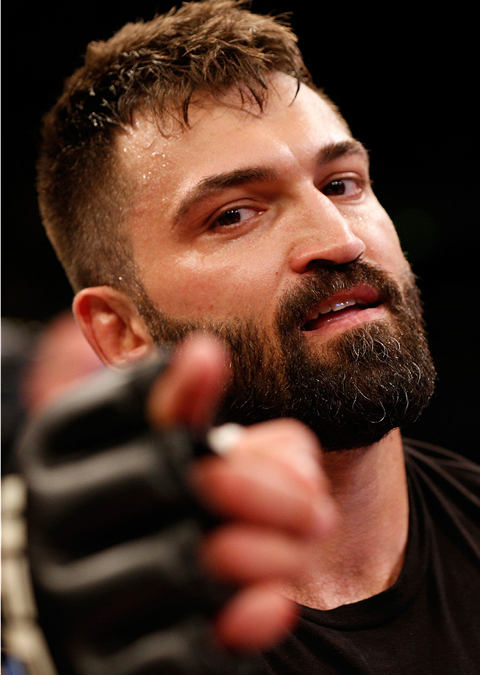 BRASILIA, BRAZIL - SEPTEMBER 13: Andrei Arlovski of Belarus celebrates after his knockout victory over Antonio "Bigfoot" Silva of Brazil in their heavyweight bout during the UFC Fight Night event inside Nilson Nelson Gymnasium on September 13, 2014 in Br