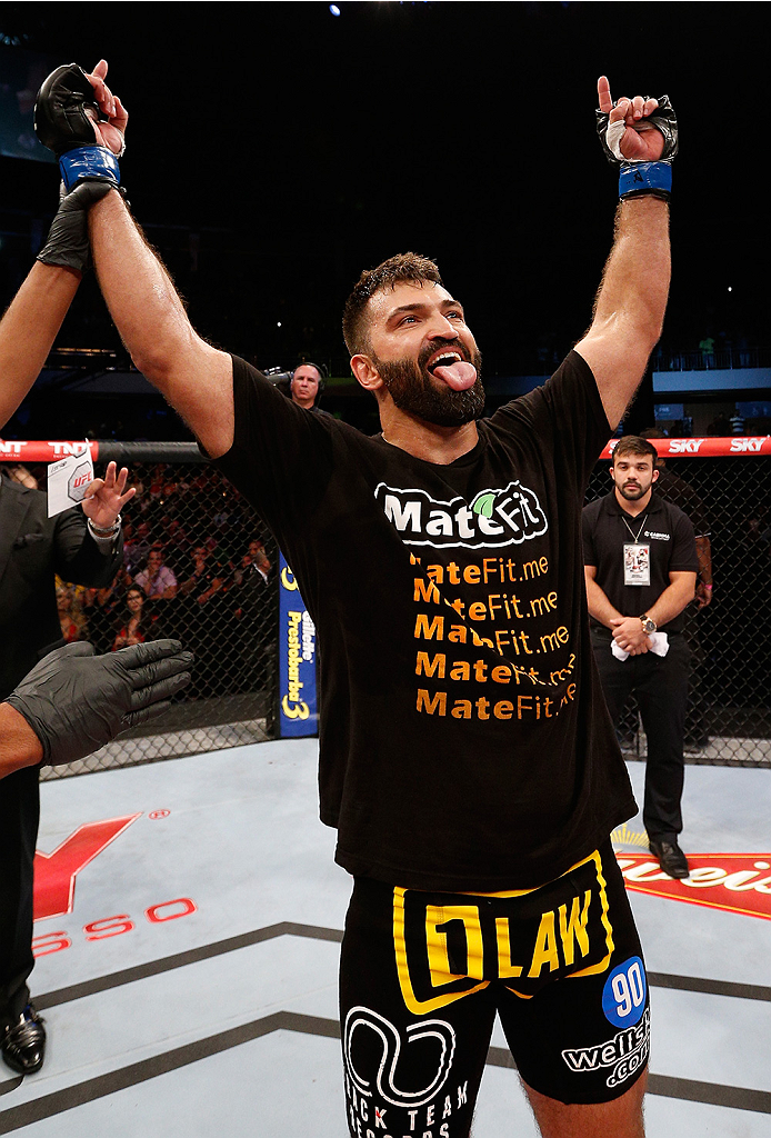 BRASILIA, BRAZIL - SEPTEMBER 13: Andrei Arlovski of Belarus celebrates after his knockout victory over Antonio "Bigfoot" Silva of Brazil in their heavyweight bout during the UFC Fight Night event inside Nilson Nelson Gymnasium on September 13, 2014 in Br