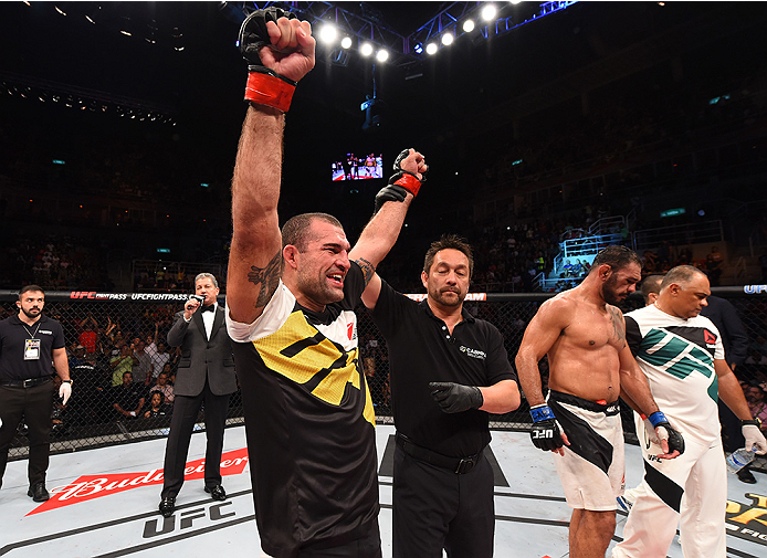 RIO DE JANEIRO, BRAZIL - AUGUST 01: (L-R) Mauricio 'Shogun' Rua of Brazil celebrates his victory over Rogerio Nogueira of Brazil in their light heavyweight bout during the UFC 190 event inside HSBC Arena on August 1, 2015 in Rio de Janeiro, Brazil. (Pho