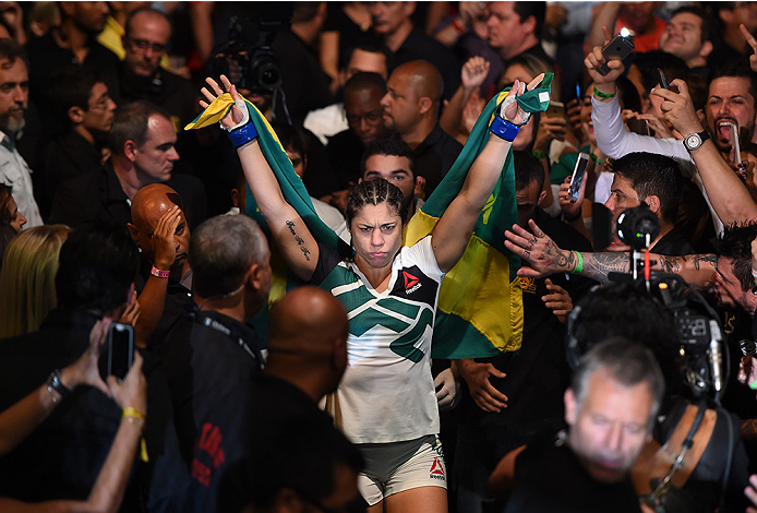 RIO DE JANEIRO, BRAZIL - AUGUST 01: Bethe Correia of Brazil prepares to enter the Octagon before facing Ronda Rousey of the United States in their UFC women's bantamweight championship bout during the UFC 190 event inside HSBC Arena on August 1, 2015 in