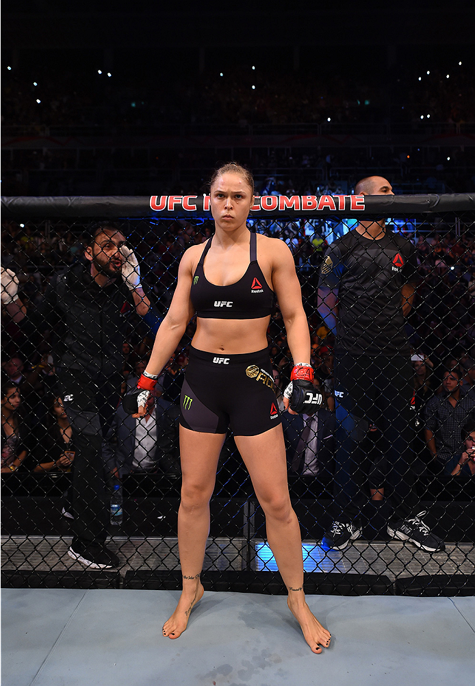 RIO DE JANEIRO, BRAZIL - AUGUST 01: UFC strawweight champion Ronda Rousey of the United States enters the Octagon before facing Bethe Correia of Brazil in their UFC women's bantamweight championship bout during the UFC 190 event inside HSBC Arena on Augu