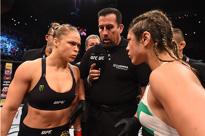 RIO DE JANEIRO, BRAZIL - AUGUST 01: UFC strawweight champion Ronda Rousey of the United States Bethe Correia of Brazil face off in their UFC women's bantamweight championship bout during the UFC 190 event inside HSBC Arena on August 1, 2015 in Rio de Jan