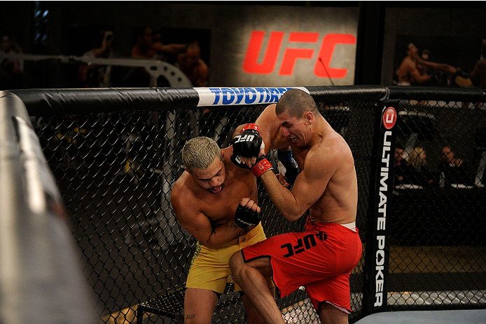 LACHUTE, CANADA - NOVEMBER 11: (L-R) Team Australia fighter Tyler Manawaroa exchanges punches with Team Canada fighter Nordine Taleb in their middleweight fight during filming of The Ultimate Fighter Nations television series on November 11, 2013 in Lach