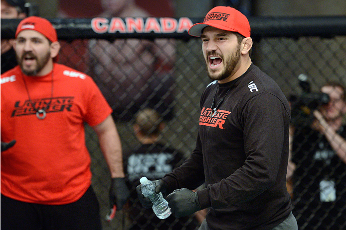 LACHUTE, CANADA - NOVEMBER 17: Team Canada coach Patrick Cote cheers on his fighter Sheldon Westcott after submitting Team Australia fighter Daniel Kelly in their middleweight fight during filming of The Ultimate Fighter Nations television series on Nove