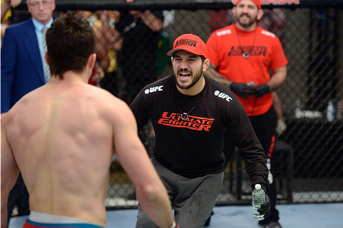 LACHUTE, CANADA - NOVEMBER 17: Team Canada coach Patrick Cote cheers on his fighter Sheldon Westcott after submitting Team Australia fighter Daniel Kelly in their middleweight fight during filming of The Ultimate Fighter Nations television series on Nove