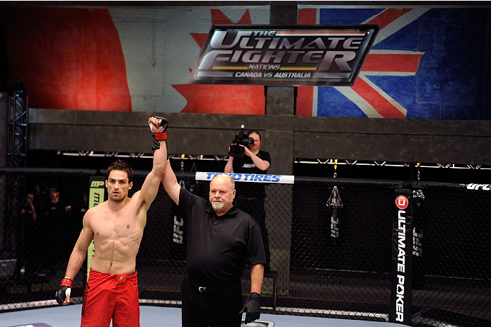 LACHUTE, CANADA - NOVEMBER 17: Team Canada fighter Sheldon Westcott celebrates after defeating Team Australia fighter Daniel Kelly by submission in their middleweight fight during filming of The Ultimate Fighter Nations television series on November 17,