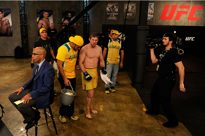LACHUTE, CANADA - NOVEMBER 17: Team Australia fighter Daniel Kelly walks to the locker room after being submitted by Team Canada fighter Sheldon Westcott in their middleweight fight during filming of The Ultimate Fighter Nations television series on Nove