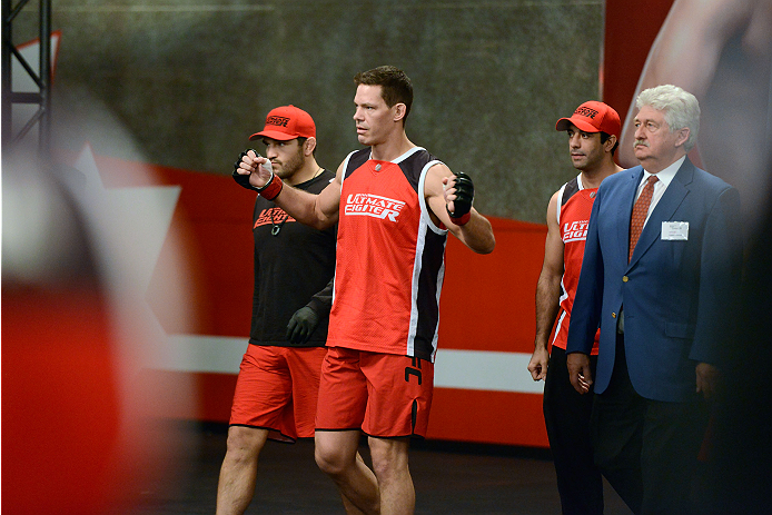LACHUTE, CANADA - DECEMBER 2: Team Canada fighter Luke Harris walks into the gym before taking on Team Australia fighter Vik Grujic in their middleweight fight during filming of The Ultimate Fighter Nations television series on December 2, 2013 in Lachut