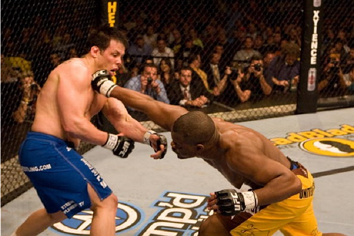 HOLLYWOOD, FL - JANUARY 25: Rashad Evans (yellow shorts) def. Sean Salmon (blue shorts) - KO - 1:06 round 2 during UFC Fight Night 08 at the Hard Rock Live - Seminole Hard Rock Hotel & Casino on January 25, 2007 in Hollywood, Florida. (Photo by Josh Hedg