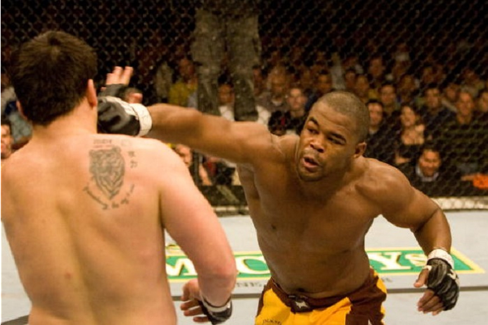 HOLLYWOOD, FL - JANUARY 25: Rashad Evans (yellow shorts) def. Sean Salmon (blue shorts) - KO - 1:06 round 2 during UFC Fight Night 08 at the Hard Rock Live - Seminole Hard Rock Hotel & Casino on January 25, 2007 in Hollywood, Florida. (Photo by Josh Hedg