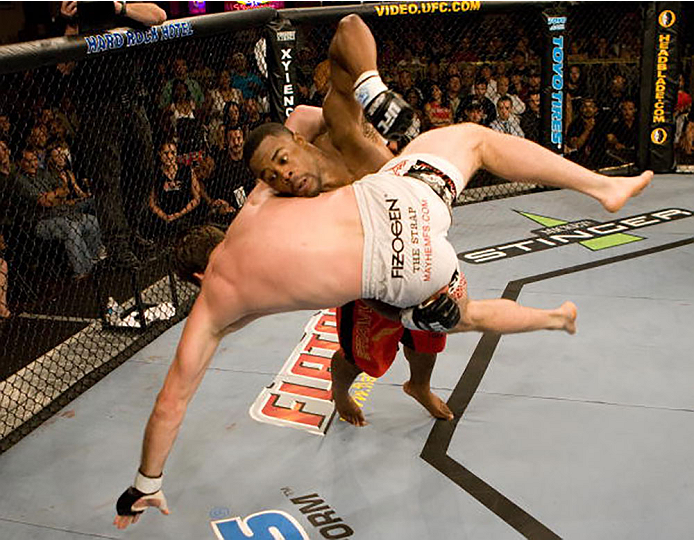 LAS VEGAS - JUNE 28: (R-L) Rashad Evans takes down Stephan Bonnar at UFC Fight Night 5 at the Joint at the Hard Rock on June 28, 2006 in Las Vegas, Nevada. (Photo by Josh Hedges/Zuffa LLC/Zuffa LLC via Getty Images)