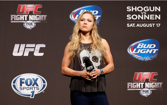 BOSTON, MA - AUGUST 16: UFC women's bantamweight champion Ronda Rousey interacts with fans during a Q&A session befofe the UFC weigh-in inside TD Garden on August 16, 2013 in Boston, Massachusetts. (Photo by Josh Hedges/Zuffa LLC/Zuffa LLC via Getty Imag