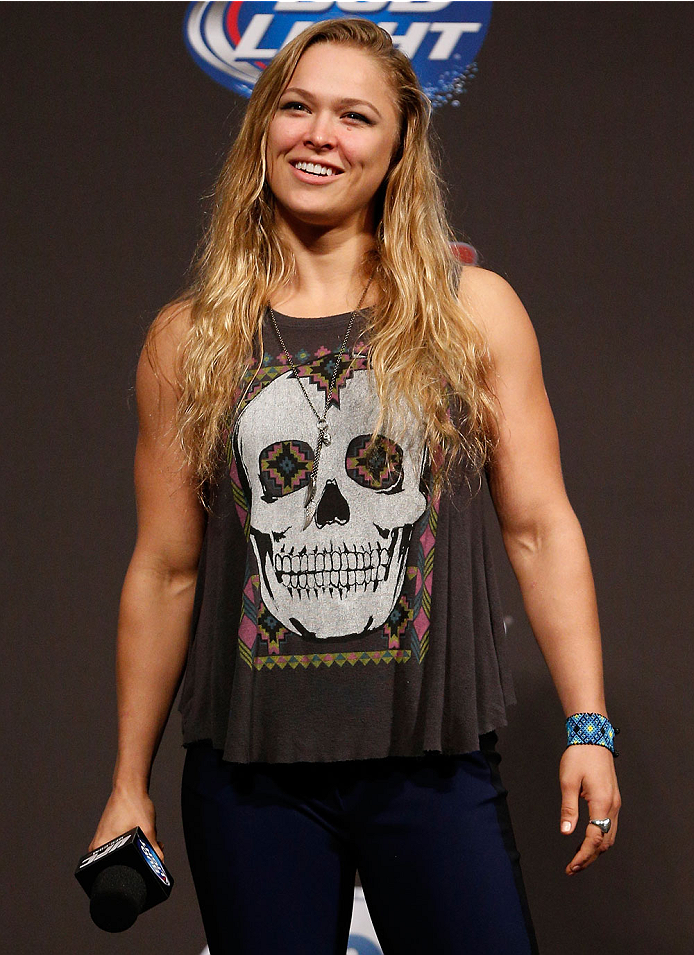 BOSTON, MA - AUGUST 16: UFC women's bantamweight champion Ronda Rousey interacts with fans during a Q&A session befofe the UFC weigh-in inside TD Garden on August 16, 2013 in Boston, Massachusetts. (Photo by Josh Hedges/Zuffa LLC/Zuffa LLC via Getty Imag