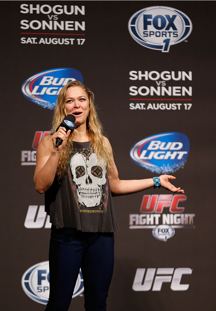 BOSTON, MA - AUGUST 16: UFC women's bantamweight champion Ronda Rousey interacts with fans during a Q&A session befofe the UFC weigh-in inside TD Garden on August 16, 2013 in Boston, Massachusetts. (Photo by Josh Hedges/Zuffa LLC/Zuffa LLC via Getty Imag
