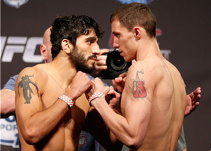 BOSTON, MA - AUGUST 16: (L-R) Opponents Ramsey Nijem and James Vick face off during the UFC weigh-in inside TD Garden on August 16, 2013 in Boston, Massachusetts. (Photo by Josh Hedges/Zuffa LLC/Zuffa LLC via Getty Images)