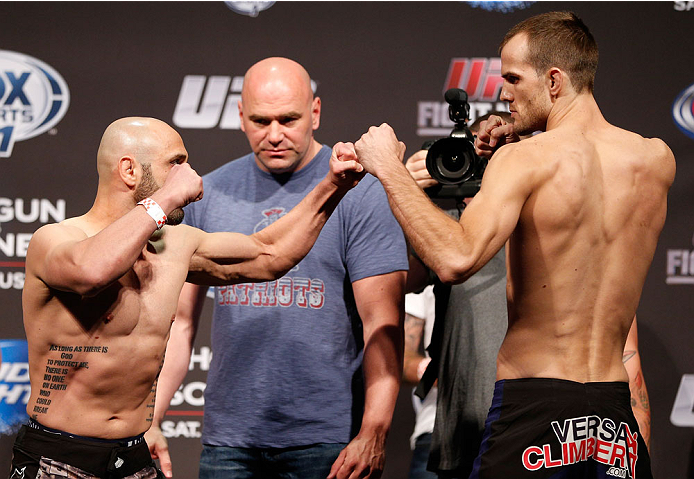 BOSTON, MA - AUGUST 16: (L-R) Opponents Manny Gamburyan and Cole Miller face off during the UFC weigh-in inside TD Garden on August 16, 2013 in Boston, Massachusetts. (Photo by Josh Hedges/Zuffa LLC/Zuffa LLC via Getty Images)