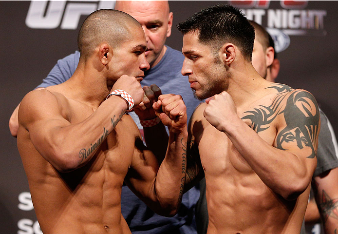 BOSTON, MA - AUGUST 16: (L-R) Opponents Diego Brandao and Daniel Pineda face off during the UFC weigh-in inside TD Garden on August 16, 2013 in Boston, Massachusetts. (Photo by Josh Hedges/Zuffa LLC/Zuffa LLC via Getty Images)