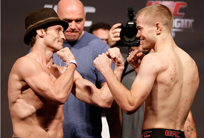 BOSTON, MA - AUGUST 16: (L-R) Opponents Brad Pickett and Michael McDonald face off during the UFC weigh-in inside TD Garden on August 16, 2013 in Boston, Massachusetts. (Photo by Josh Hedges/Zuffa LLC/Zuffa LLC via Getty Images)