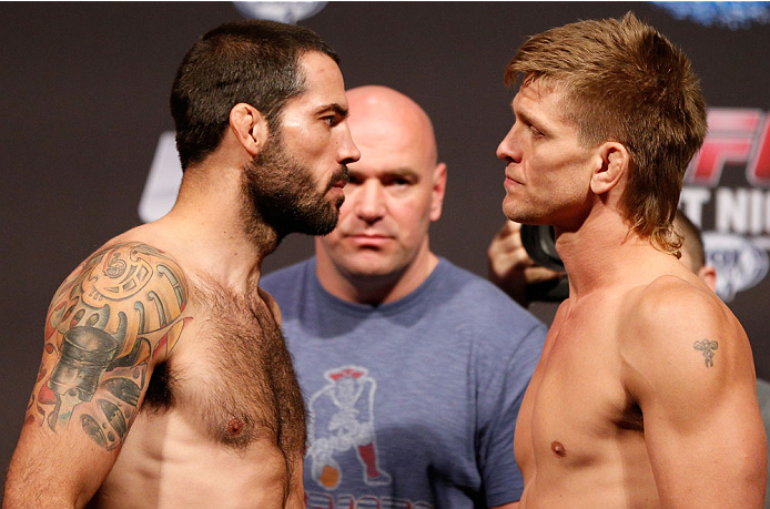 BOSTON, MA - AUGUST 16: (L-R) Opponents Matt Brown and Mike Pyle face off during the UFC weigh-in inside TD Garden on August 16, 2013 in Boston, Massachusetts. (Photo by Josh Hedges/Zuffa LLC/Zuffa LLC via Getty Images)