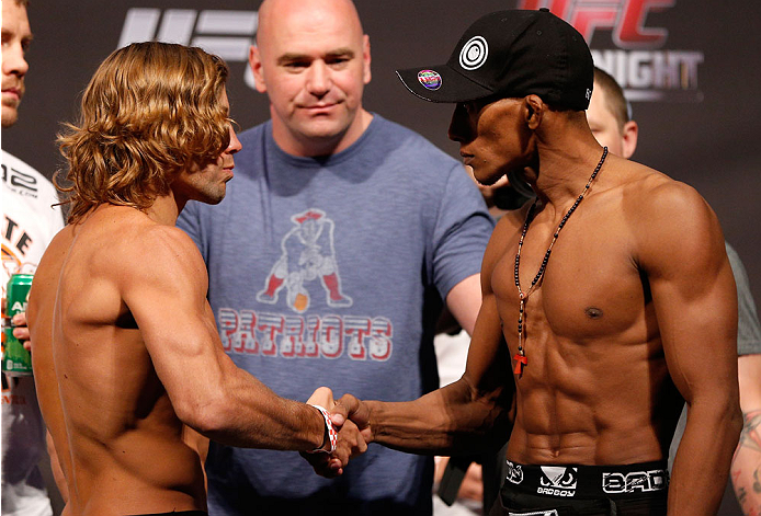BOSTON, MA - AUGUST 16: (L-R) Opponents Urijah Faber and Iuri Alcantara shake hands during the UFC weigh-in inside TD Garden on August 16, 2013 in Boston, Massachusetts. (Photo by Josh Hedges/Zuffa LLC/Zuffa LLC via Getty Images)