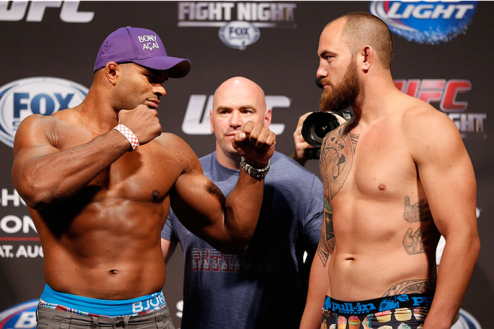 BOSTON, MA - AUGUST 16: (L-R) Opponents Alistair Overeem and Travis Browne face off during the UFC weigh-in inside TD Garden on August 16, 2013 in Boston, Massachusetts. (Photo by Josh Hedges/Zuffa LLC/Zuffa LLC via Getty Images)