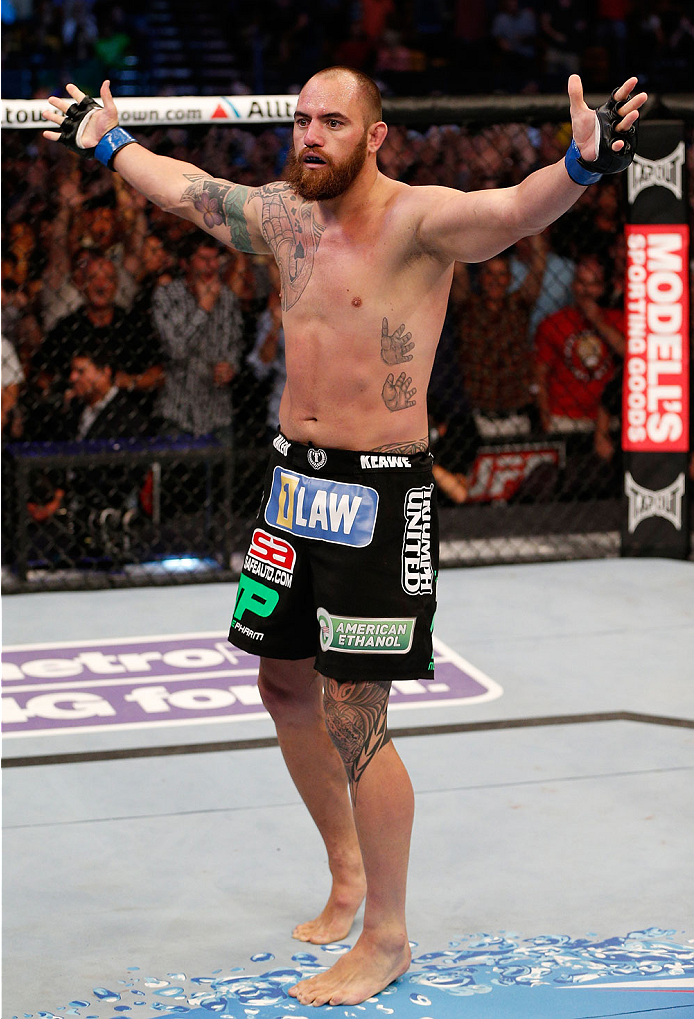 BOSTON, MA - AUGUST 17: Travis Browne reacts after knocking out Alistair Overeem in their UFC heavyweight bout at TD Garden on August 17, 2013 in Boston, Massachusetts. (Photo by Josh Hedges/Zuffa LLC/Zuffa LLC via Getty Images)