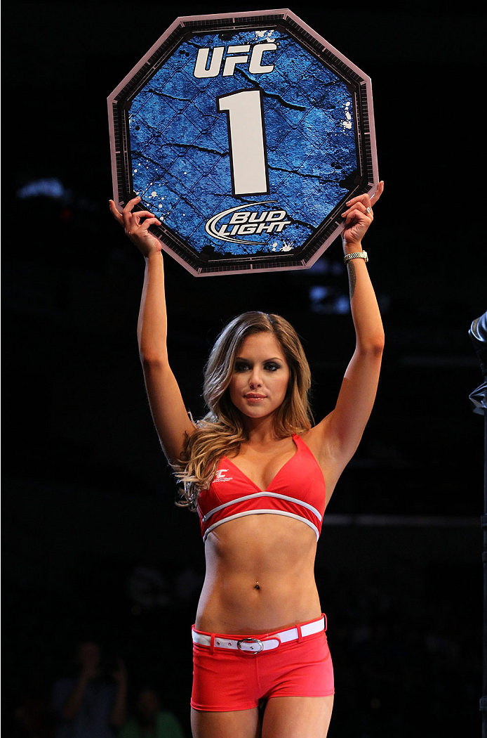 INDIANAPOLIS, IN - AUGUST 28: UFC Octagon Girl Brittney Palmer introduces a round during the UFC on FOX Sports 1 event at Bankers Life Fieldhouse on August 28, 2013 in Indianapolis, Indiana. (Photo by Ed Mulholland/Zuffa LLC/Zuffa LLC via Getty Images)
