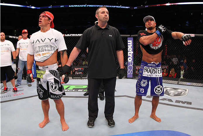 INDIANAPOLIS, IN - AUGUST 28: Roger Bowling (L) and Abel Trujillo (R) react after their lightweight fight was declared a no-contest during the UFC on FOX Sports 1 event at Bankers Life Fieldhouse on August 28, 2013 in Indianapolis, Indiana. (Photo by Ed