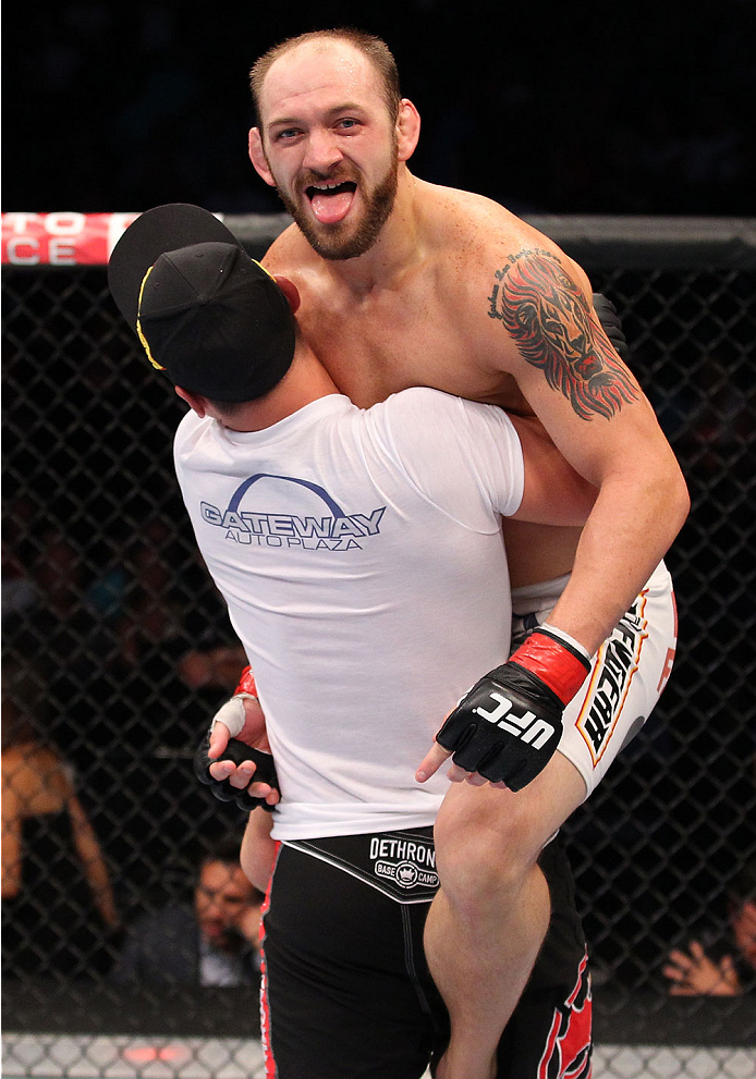 INDIANAPOLIS, IN - AUGUST 28: Zak Cummings reacts after his submission victory over Benny Alloway in their welterweight fight during the UFC on FOX Sports 1 event at Bankers Life Fieldhouse on August 28, 2013 in Indianapolis, Indiana. (Photo by Ed Mulhol