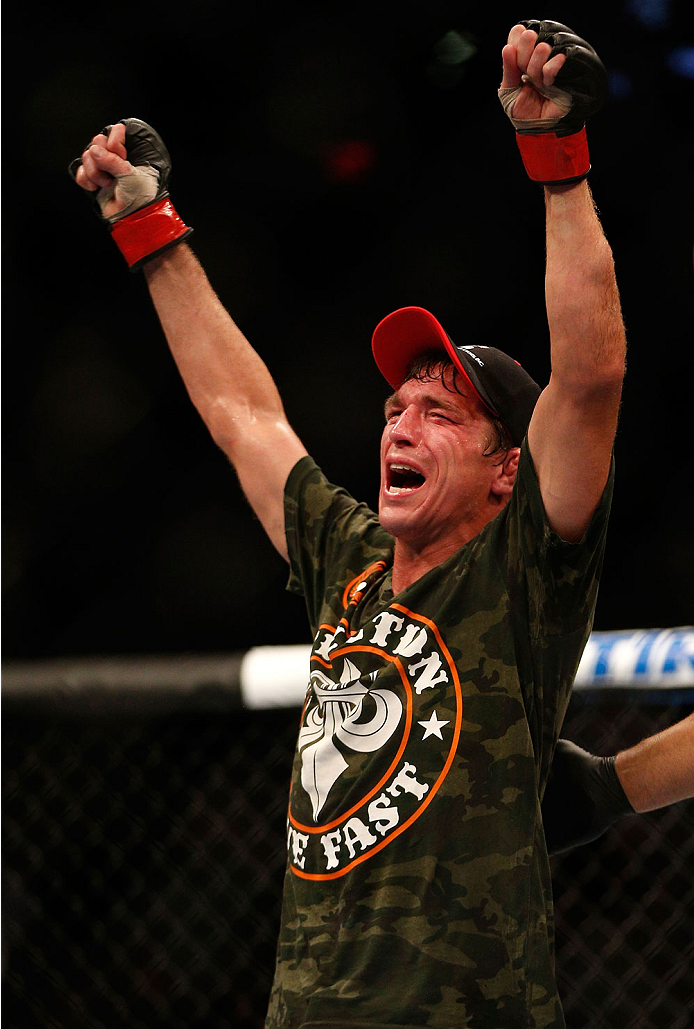 INDIANAPOLIS, IN - AUGUST 28: Darren Elkins reacts after his victory over Hatsu Hioki in their featherweight fight during the UFC on FOX Sports 1 event at Bankers Life Fieldhouse on August 28, 2013 in Indianapolis, Indiana. (Photo by Josh Hedges/Zuffa LL