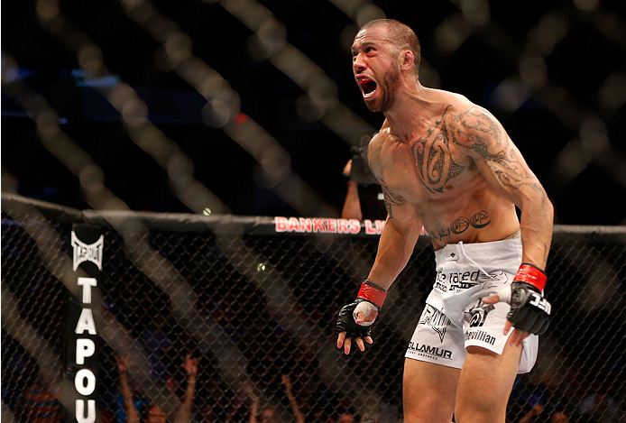INDIANAPOLIS, IN - AUGUST 28: Dylan Andrews reacts after his knockout victory over Papy Abedi in their middleweight fight during the UFC on FOX Sports 1 event at Bankers Life Fieldhouse on August 28, 2013 in Indianapolis, Indiana. (Photo by Josh Hedges/Z