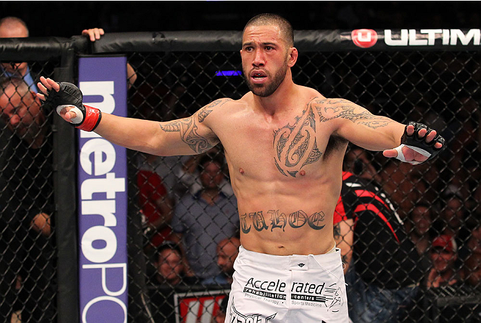 INDIANAPOLIS, IN - AUGUST 28: Dylan Andrews reacts after knocking out Papy Abedi in their middleweight fight during the UFC on FOX Sports 1 event at Bankers Life Fieldhouse on August 28, 2013 in Indianapolis, Indiana. (Photo by Ed Mulholland/Zuffa LLC/Zu
