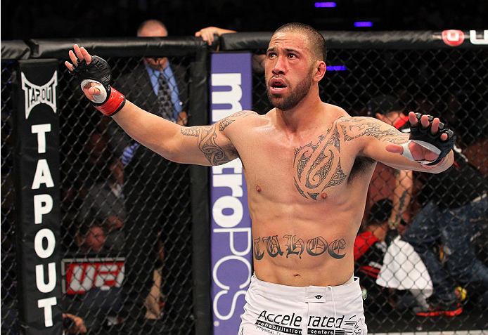 INDIANAPOLIS, IN - AUGUST 28: Dylan Andrews reacts after knocking out Papy Abedi in their middleweight fight during the UFC on FOX Sports 1 event at Bankers Life Fieldhouse on August 28, 2013 in Indianapolis, Indiana. (Photo by Ed Mulholland/Zuffa LLC/Zu