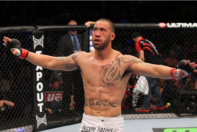 INDIANAPOLIS, IN - AUGUST 28: Dylan Andrews reacts after knocking out Papy Abedi in their middleweight fight during the UFC on FOX Sports 1 event at Bankers Life Fieldhouse on August 28, 2013 in Indianapolis, Indiana. (Photo by Ed Mulholland/Zuffa LLC/Zu