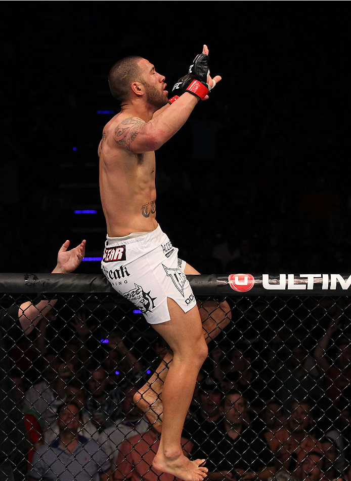 INDIANAPOLIS, IN - AUGUST 28: Dylan Andrews reacts after knocking out Papy Abedi in their middleweight fight during the UFC on FOX Sports 1 event at Bankers Life Fieldhouse on August 28, 2013 in Indianapolis, Indiana. (Photo by Ed Mulholland/Zuffa LLC/Zu