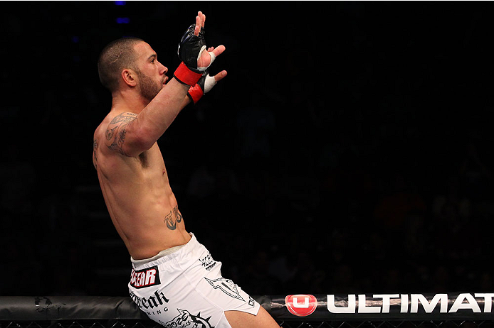 INDIANAPOLIS, IN - AUGUST 28: Dylan Andrews reacts after knocking out Papy Abedi in their middleweight fight during the UFC on FOX Sports 1 event at Bankers Life Fieldhouse on August 28, 2013 in Indianapolis, Indiana. (Photo by Ed Mulholland/Zuffa LLC/Zu