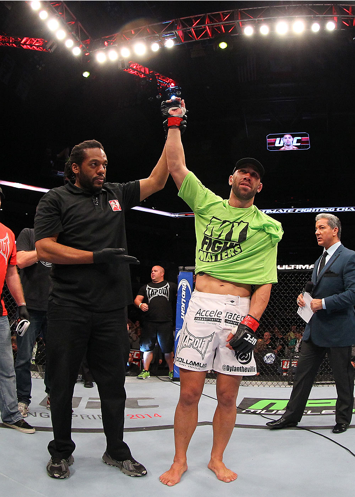 INDIANAPOLIS, IN - AUGUST 28: Dylan Andrews reacts after knocking out Papy Abedi in their middleweight fight during the UFC on FOX Sports 1 event at Bankers Life Fieldhouse on August 28, 2013 in Indianapolis, Indiana. (Photo by Ed Mulholland/Zuffa LLC/Zu