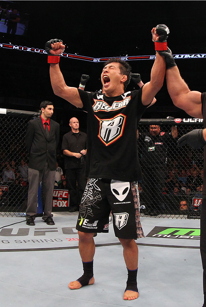 INDIANAPOLIS, IN - AUGUST 28: Takeya Mizugaki reacts after his victory over Erik Perez in their bantamweight fight during the UFC on FOX Sports 1 event at Bankers Life Fieldhouse on August 28, 2013 in Indianapolis, Indiana. (Photo by Ed Mulholland/Zuffa
