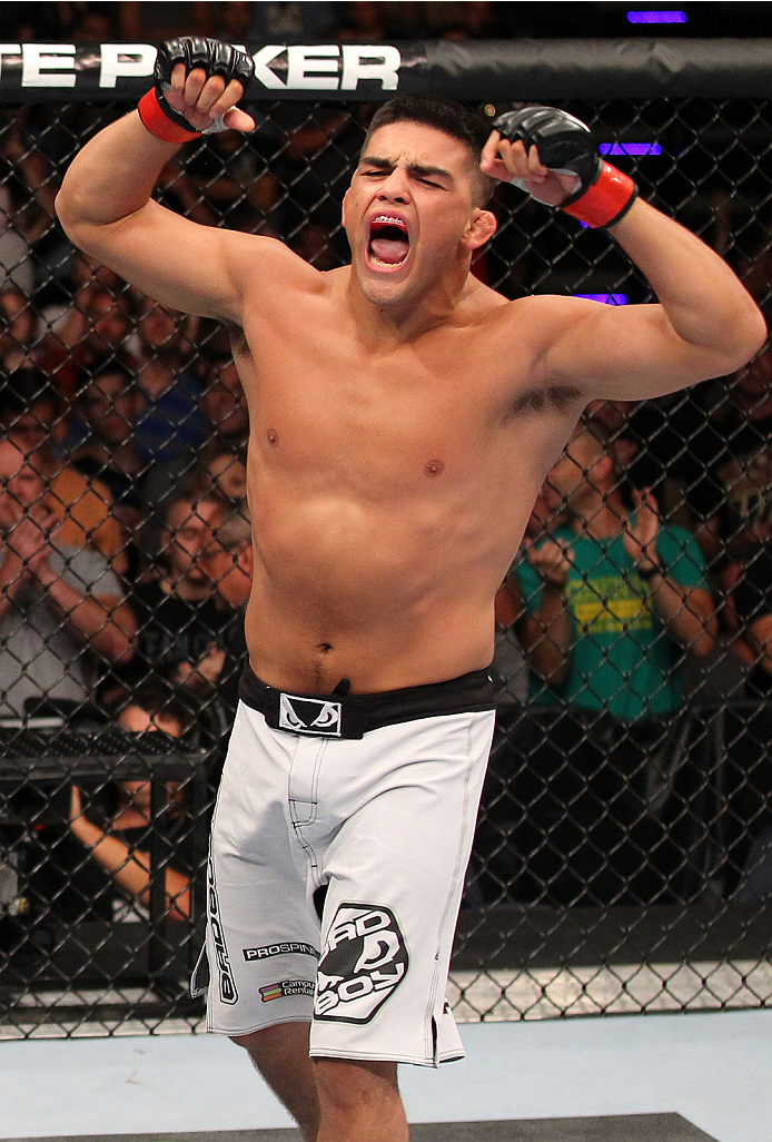 INDIANAPOLIS, IN - AUGUST 28: Kelvin Gastelum reacts after his submission victory over Brian Melancon in their welterweight fight during the UFC on FOX Sports 1 event at Bankers Life Fieldhouse on August 28, 2013 in Indianapolis, Indiana. (Photo by Ed Mu