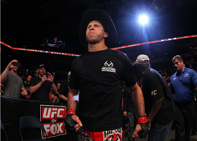 INDIANAPOLIS, IN - AUGUST 28: Donald "Cowboy" Cerrone enters the arena before his lightweight fight against Rafael dos Anjos during the UFC on FOX Sports 1 event at Bankers Life Fieldhouse on August 28, 2013 in Indianapolis, Indiana. (Photo by Ed Mulholl