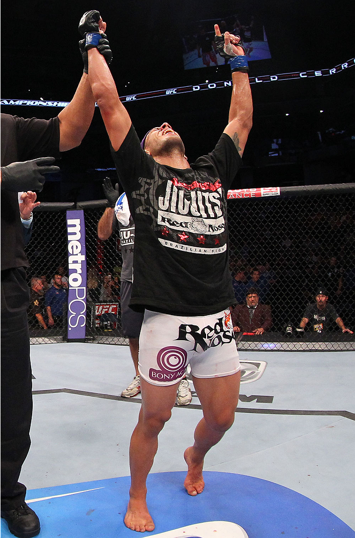 INDIANAPOLIS, IN - AUGUST 28: Rafael dos Anjos reacts after defeating Donald "Cowboy" Cerrone in their lightweight fight during the UFC on FOX Sports 1 event at Bankers Life Fieldhouse on August 28, 2013 in Indianapolis, Indiana. (Photo by Ed Mulholland/