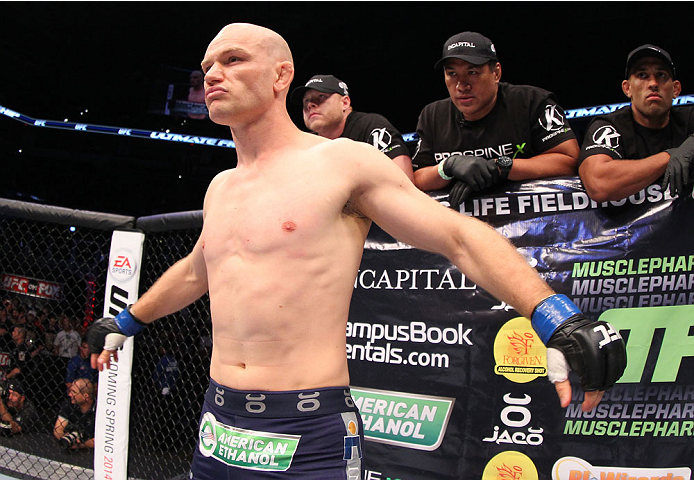 INDIANAPOLIS, IN - AUGUST 28: Martin Kampmann stands in the Octagon before his welterweight fight against Carlos Condit during the UFC on FOX Sports 1 event at Bankers Life Fieldhouse on August 28, 2013 in Indianapolis, Indiana. (Photo by Ed Mulholland/Zu