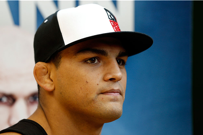 INDIANAPOLIS, IN - AUGUST 26: Kelvin Gastelum interacts with media at Banker's Life Fieldhouse on August 26, 2013 in Indianapolis, Indiana. (Photo by Josh Hedges/Zuffa LLC/Zuffa LLC via Getty Images)